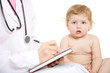 Photo: Doctor pediatrician write receipt for little patient Doctor pediatrician write receipt for little patient