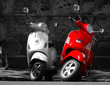 This is two motorcycles in the city.