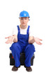 Helpless female builder in blue helmet and jumpsuit