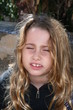 face of a child feeling ill