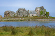 Cottage between rocks, brittany, france.