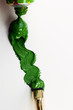 Green oil color with brush