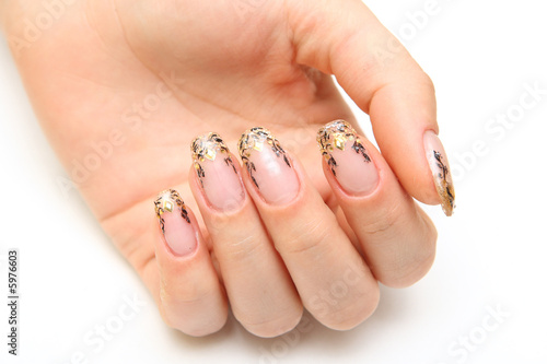 Manicure, women's hands with beautiful drawings on the nails