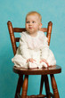 Baby make a wry face.