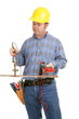 Electrician trying to repair plumbing using a voltage meter.