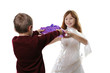 The boy gives a gift to the favourite girl