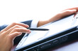Image of modern work: human hand pointing at a monitor 