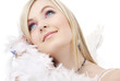 Photo: portrait of happy blond angel girl with feather boa portrait of happy blond angel girl with feather boa