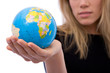 global business concept with a globe and businesswoman global business concept with a globe and businesswoman