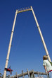 Boy looking at Jump from catapult in entertainment park 