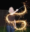 Girl waving a sparkler