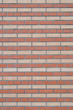 Red and cream-coloured brick wall of house. Red and cream-coloured brick wall of house.