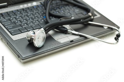 Stethoscope and laptop illustrating concept of digital security