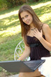 Beautiful young girl working on laptop