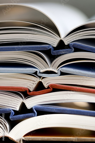 Pile of open books