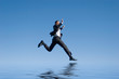 Businessman jumping in the air Businessman jumping in the air