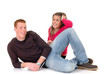 Two casual dressed young adults, teenage man and woman 