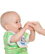Cute independent eating child with spoon. Isolated over white Cute independent eating child with spoon. Isolated over white