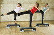 A group of young women exercising in the fitness club. 