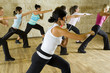 A group of women exercising with fitness instructor 