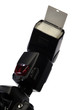 Professional flash on camera, isolated white background