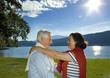 attractive married mature couple enjoying the sunset.