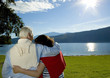 attractive married mature couple enjoying the sunset.
