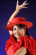 Young Spanish flamenco dancer in a red dress
