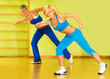 Beautiful women exercising in fitness club