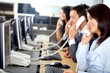 call center business team in an office full of computers