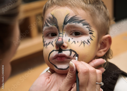 The little boy and a cheerful make-up