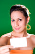 woman showing business card