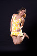 excited woman jump up high