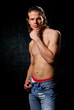 Serious young man looking at camera