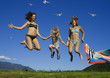 two girls having fun with a child.
