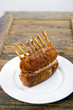 Full rack of Lamb on a white plate