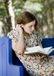 Photo: Young Woman Reading Young Woman Reading