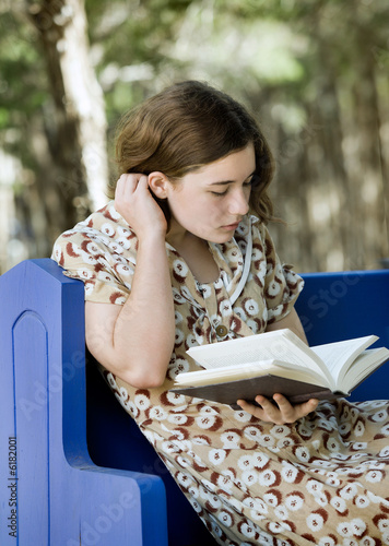 Photo: Young Woman Reading Young Woman Reading