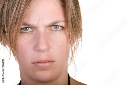 Photo: portrait of worried beautiful blond on white background portrait of worried beautiful blond on white background