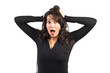 Angered young woman over a white background Angered young woman over a white background