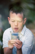 Boy with computer game Boy with computer game