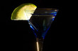 Cocktails, drinks, and alcohol in a colored glass at a bar