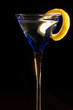 Cocktails, drinks, and alcohol in a colored glass at a bar
