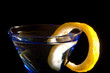 Cocktails, drinks, and alcohol in a colored glass at a bar