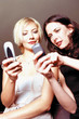 Women using mobile phones