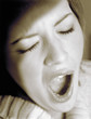 Woman yawning