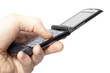 Flip mobile phone in hand