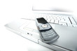 Solarized laptop and a modern slip-top cellphone