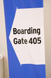 Direction signs in an airport terminal for travelers Direction signs in an airport terminal for travelers
