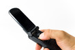 A hand hold a handset